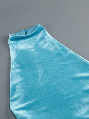 Blue velvet fabric on a gray background