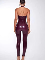 Person wearing a shiny purple jumpsuit