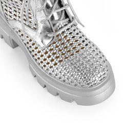 Close-up of the toe on silver mesh platform lace-up ankle boots