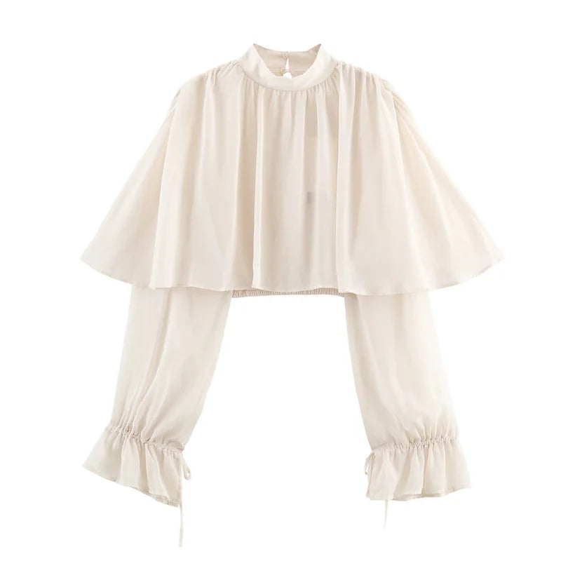 Beige blouse with ruffled sleeves and hem on a white background