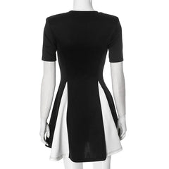 Black and white dress on a mannequin against a white background