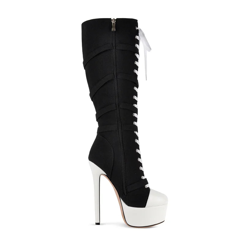 Side view of black and white lace-up platform boots
