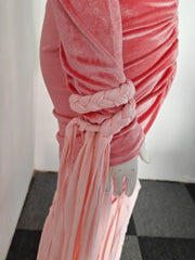 Pink velvet curtain with a knot