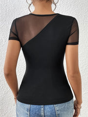 Black sheer top worn by a person