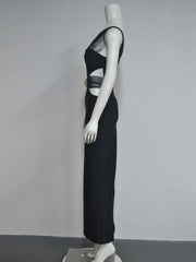 Black dress on a mannequin against a gray background