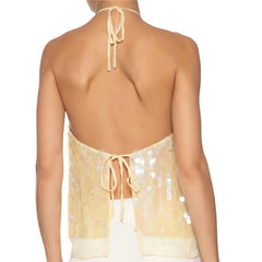Beige halter top with open back on a white background
