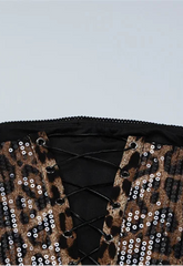 Leopard print sequin top on a light gray background