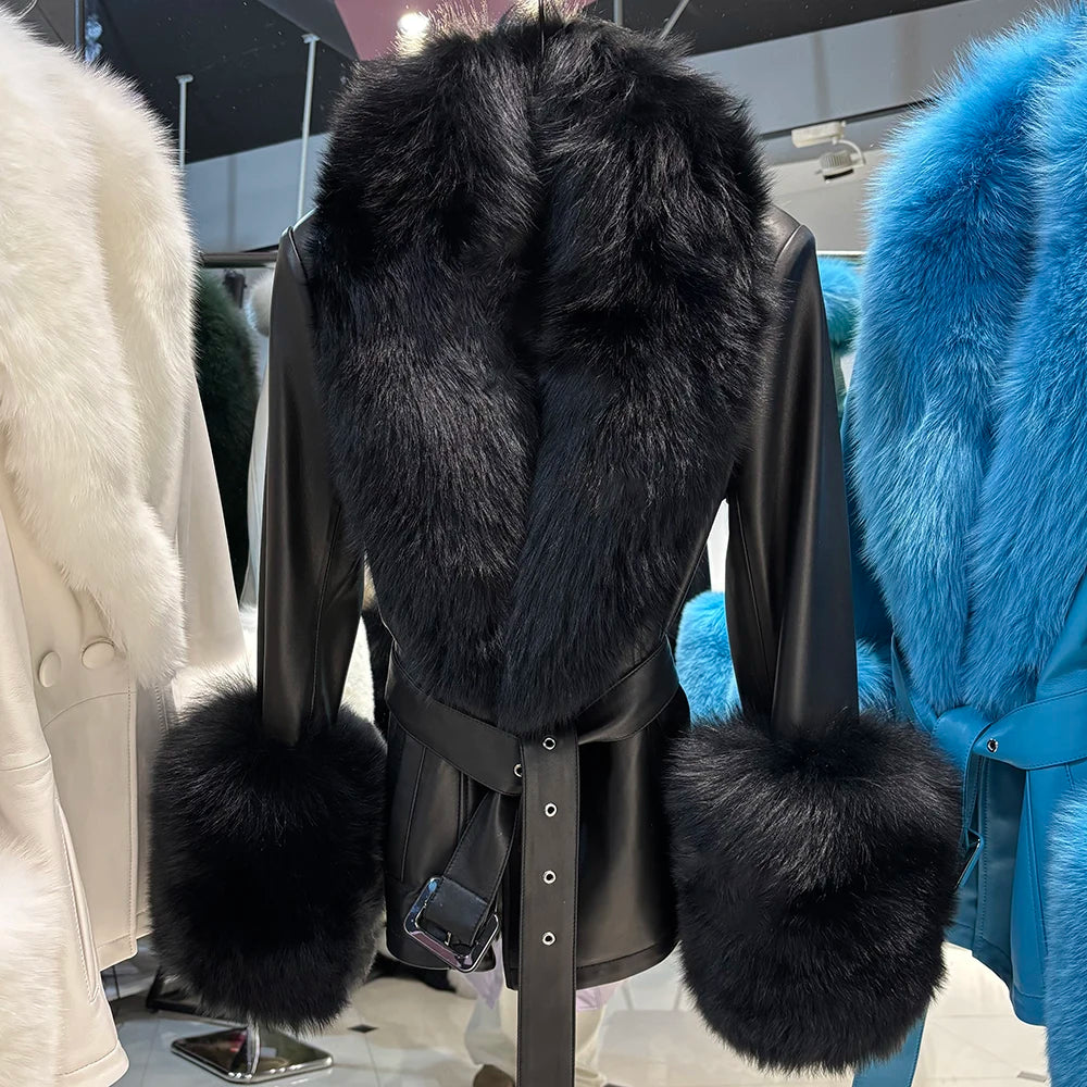 Black fur-trimmed leather jacket with large black fur cuffs displayed on a mannequin.
