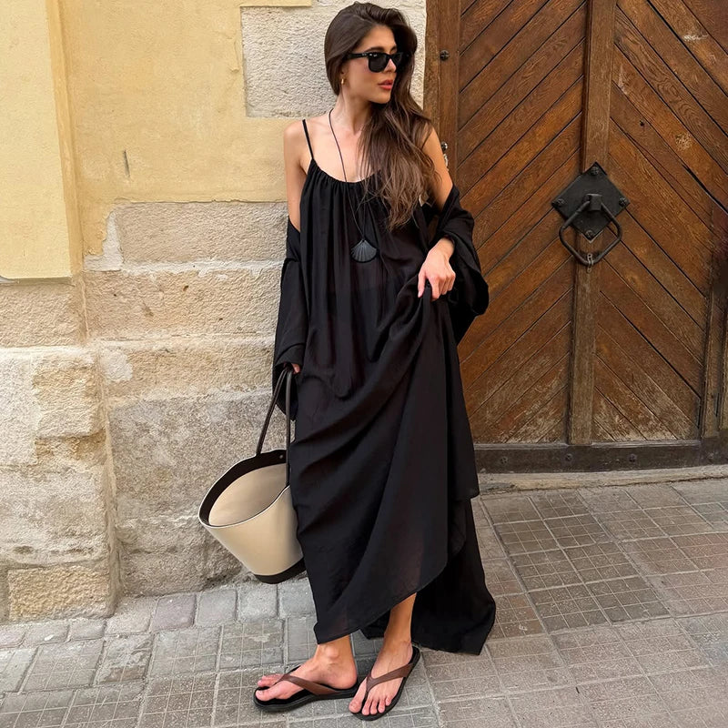Solid black camisole maxi dress with spaghetti straps