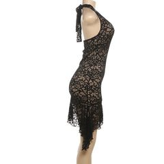 Black lace dress on a mannequin against a white background
