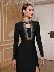 Woman wearing a black dress with intricate detailing in an elegant indoor setting