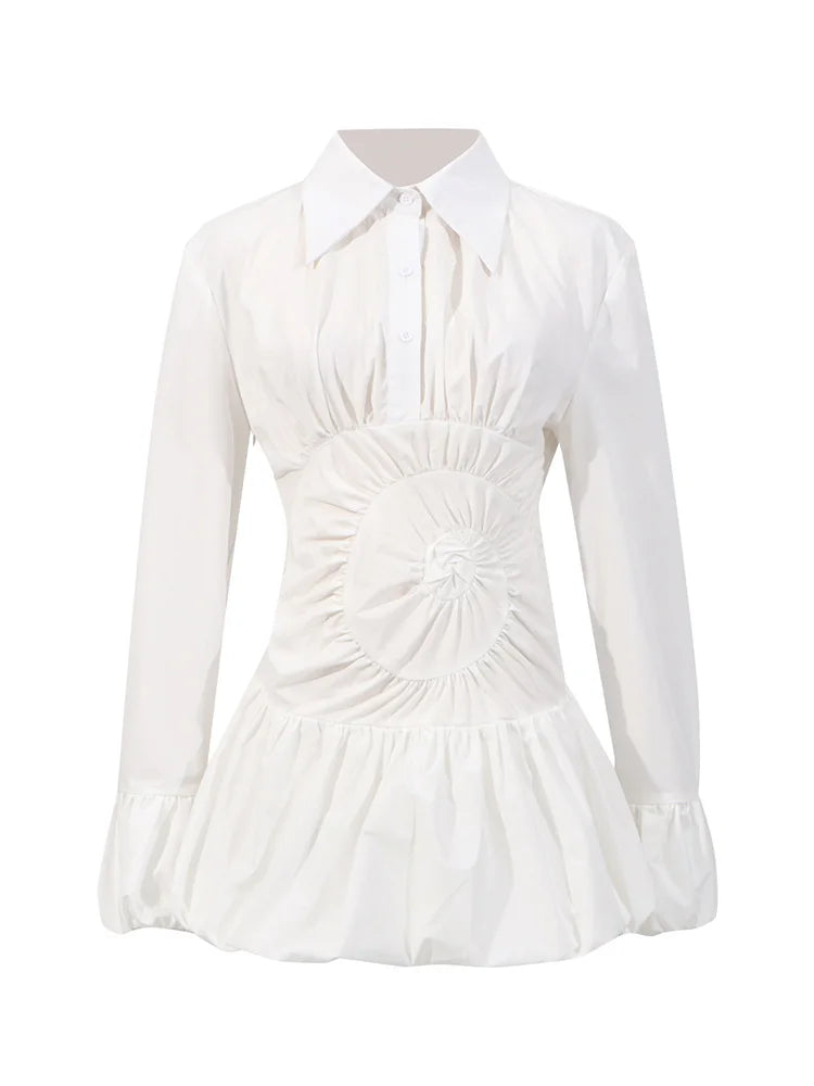 White blouse with a ruched design on a white background