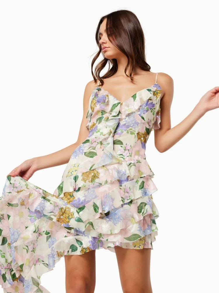 Woman wearing a floral dress on a white background