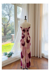 Back view of velvet color-blocked beaded column dress