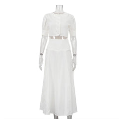 White dress on a mannequin against a white background
