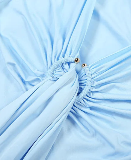 Close-up of light blue fabric with a subtle pattern