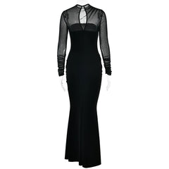Black evening gown with sheer long sleeves on a white background