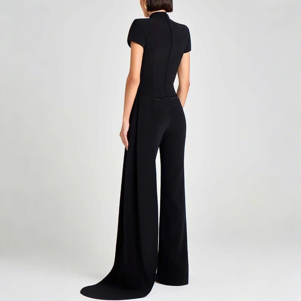 Black jumpsuit worn by a person - back