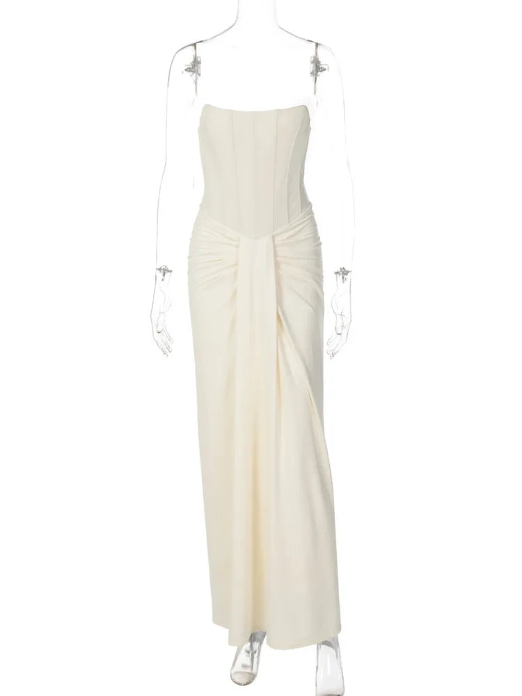 White strapless dress on a mannequin against a white background