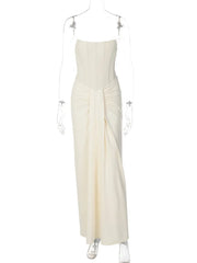 White strapless dress on a mannequin against a white background