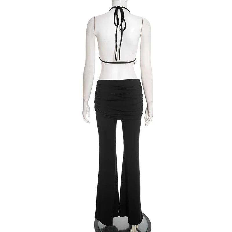 Mannequin wearing a black halter top and black flared pants on a white background