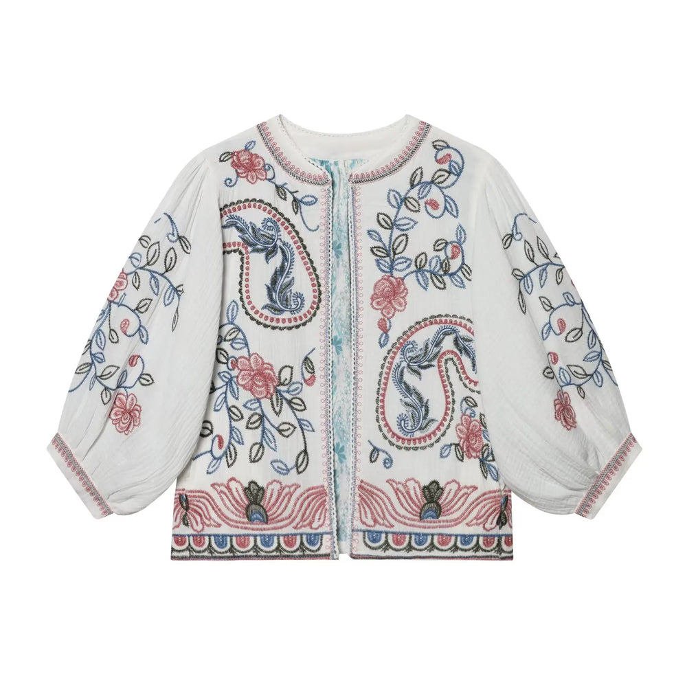 Embroidered white blouse with paisley and floral patterns, featuring lantern sleeves and an open front.