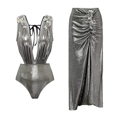 Silver metallic one-piece swimsuit with floral embellishments and a matching ruched maxi skirt