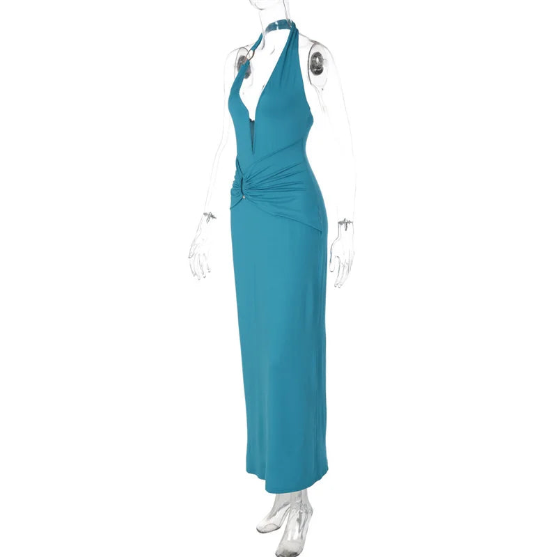 Teal evening gown on a mannequin against a white background