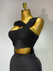 Black strapless sheath midi dress with hollow out detail.