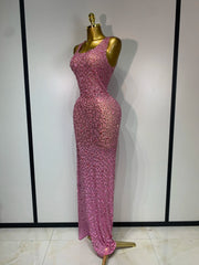 Side view of a pink diamond-embellished maxi dress on a mannequin