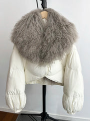 White cropped puffer jacket with a large grey curly textured fur collar and full sleeves.