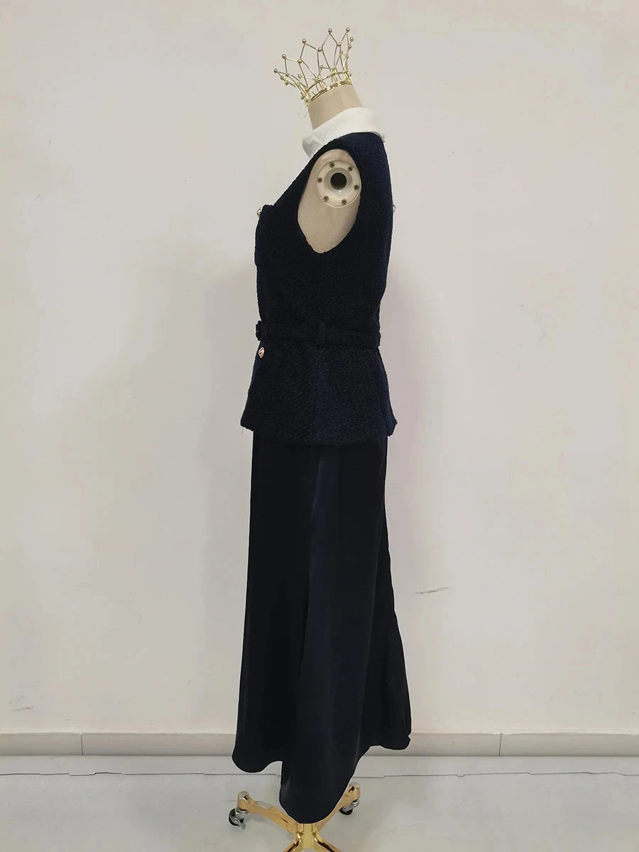 Black outfit on a mannequin with a white background