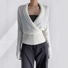 White knit wrap top with deep V-neck and long sleeves
