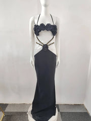 Halter neck floral maxi dress on mannequin front view