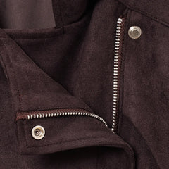Close-up of a brown jacket with zipper and buttons