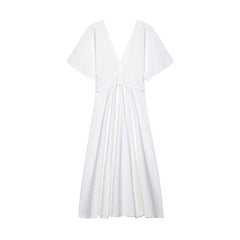 White dress with a V-neck and short sleeves on a white background