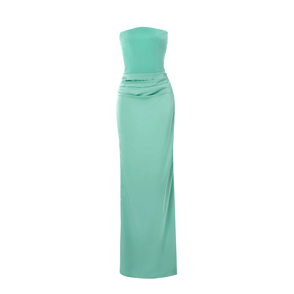 Mint green strapless gown on a white background