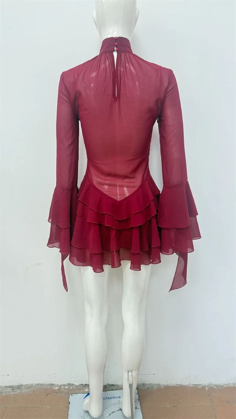 Red dress on a mannequin against a white background