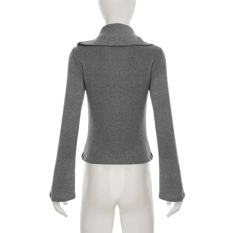 Gray blazer on a mannequin against a white background