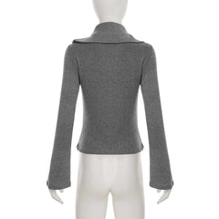 Gray blazer on a mannequin against a white background