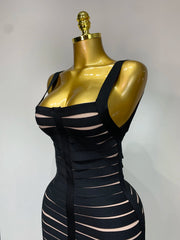 Close-up of the bodice on a sleeveless square neck bandage midi dress