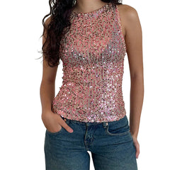Person wearing a sequined top and jeans on a white background