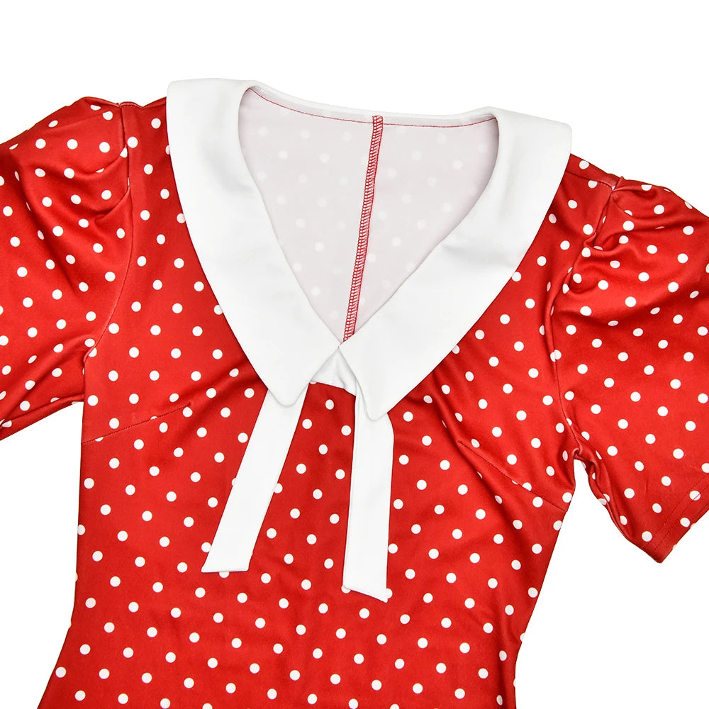 Red polka dot dress with white collar on a white background