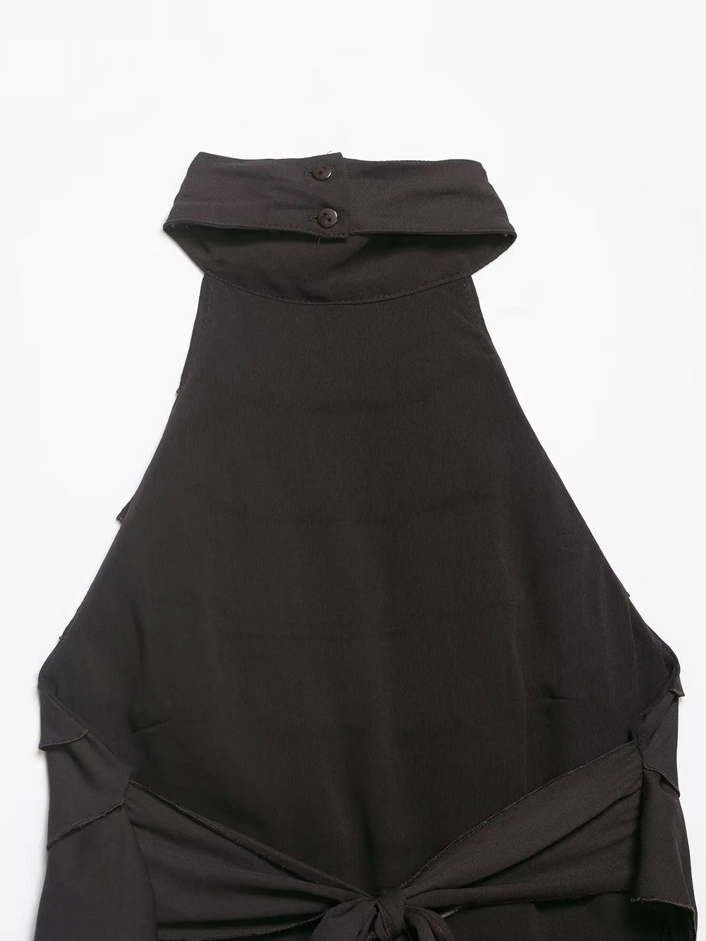 Black halter top with a button detail on a white background