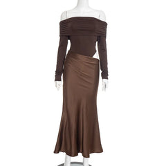 Brown off-shoulder dress on a mannequin against a white background