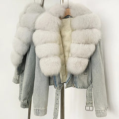 Light blue denim jacket with white fur trim