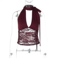 Maroon halter top with lace detail on a mannequin against a white background