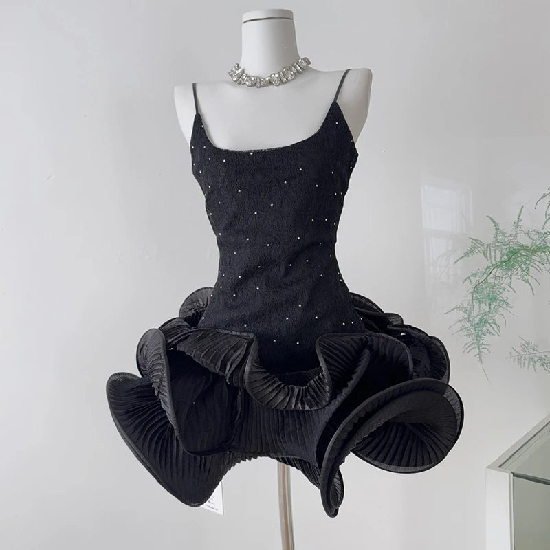 Rhinestone embellished wavy ruffled mini dress front view.