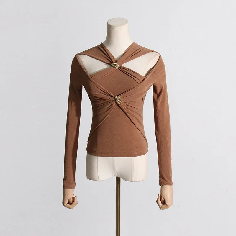 Brown long-sleeve top on a mannequin against a light gray background