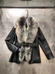 Black leather jacket with fur collar on a gray background